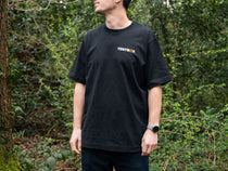 Adventure Tee - worn by a man in the woods, front view