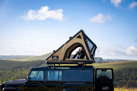 Special edition Land Rover Cargo 2.0, mounted on a Defender with a countryside view