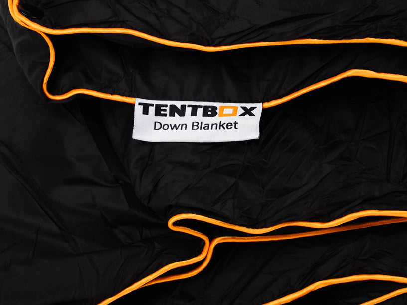 ADB - TentBox Synthetic Down Blanket close up of label and edging