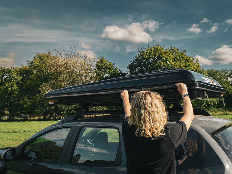 Woman sliding on the TentBox Classic 1.0 Adaptor Kit