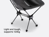 a studio image of the TentBox Camping Chair in grey,with overlay text explaining how it's light and tough, and built to support 120kg