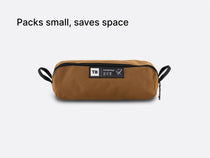 the TentBox Camping Chair in khaki, packed down into its convenient, compact-sized storage bag