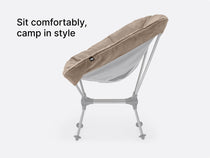 An image showing a side angle of the TentBox Camping Chair cushion in stone with overlay text saying "Sit comfortably, camp in style"