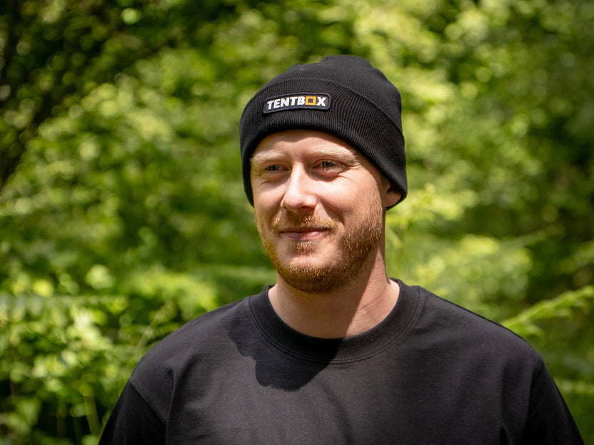Man wearing the TentBox Beanie in the forest