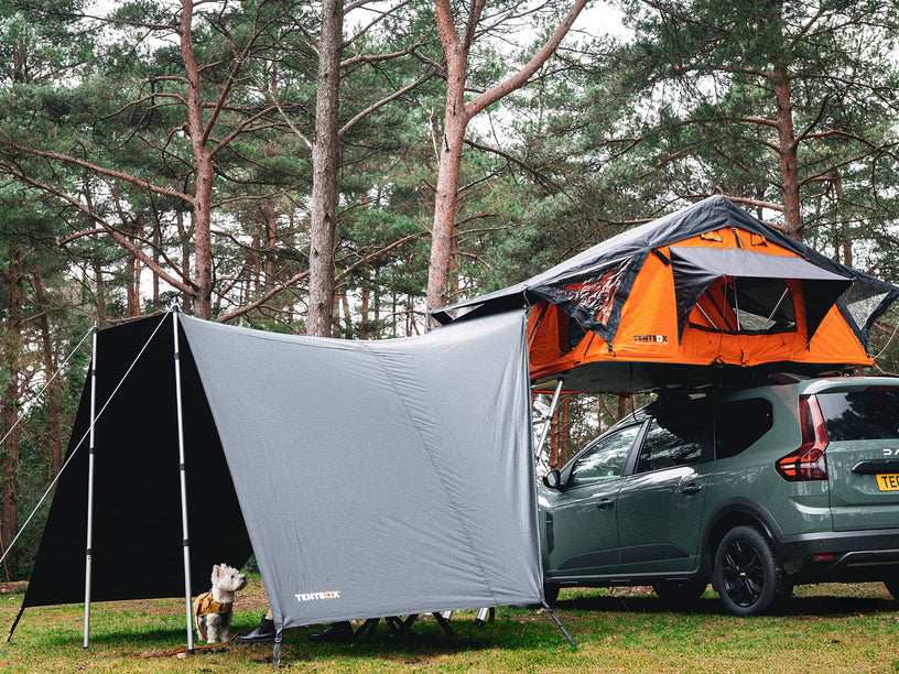 Lite 1.0 tunnel awning set up with a dog in it