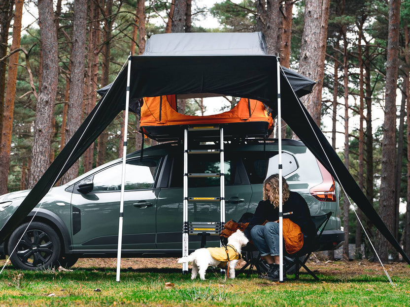 ATALI-1.0 - Woman and dog enjoying spending time under the TentBox Lite 1.0 Tunnel Awning