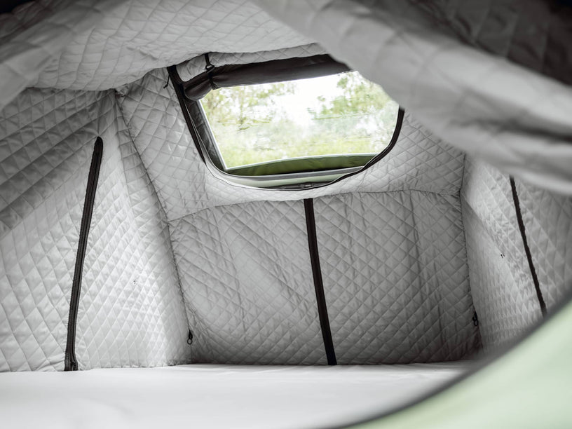 TentBox Lite Thermal Kit rolled up, showing the skylight window