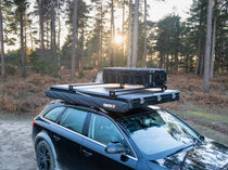 The Cargo Storage Box and Cargo Roof Bars installed on a TentBox Cargo 2.0 in the forest