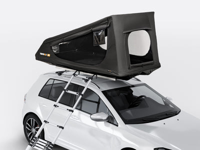 The TentBox GO on the roof of a white vehicle - Roof Tents