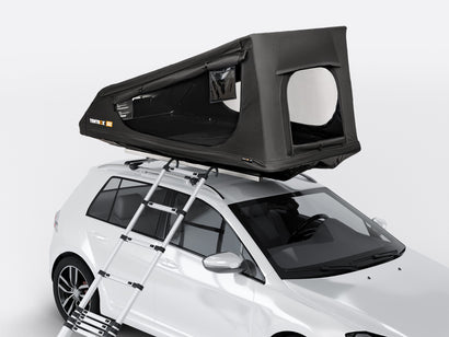 The TentBox GO on the roof of a white vehicle