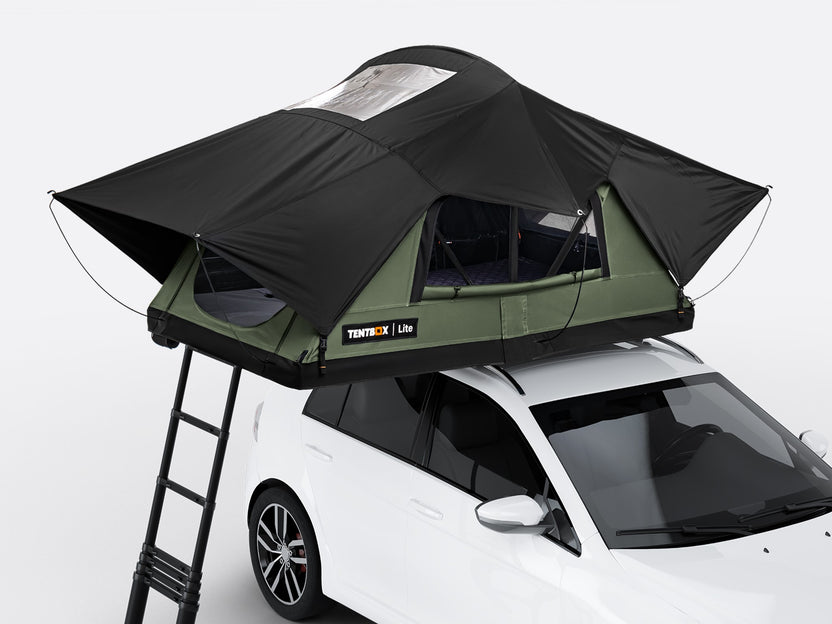The new Forest coloured TentBox Lite roof tent open on the roof of a white car