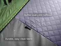 The all new TentBox Lite roof tent mattress shown with labels to say quilted dual-core mattress and durable, easy-clean fabric. 