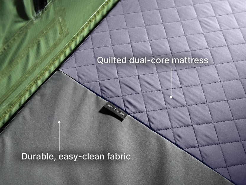 The all new TentBox Lite roof tent mattress shown with labels to say quilted dual-core mattress and durable, easy-clean fabric. 