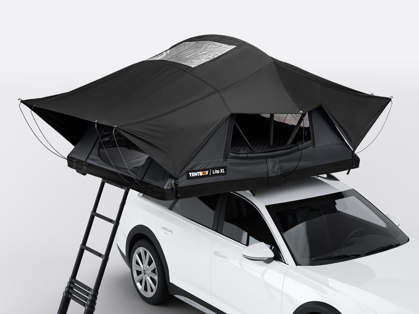 The new Flint colour option of the TentBox Lite XL on the roof of a white vehicle