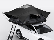 The new Flint colour option of the TentBox Lite XL on the roof of a white vehicle