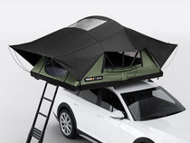 The new Forest colour option of the TentBox Lite XL on the roof of a white vehicle