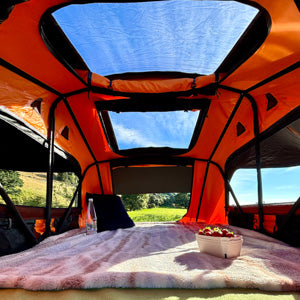 Internal view of the TentBox Lite 2.0 in Sunset Orange with dual skylights