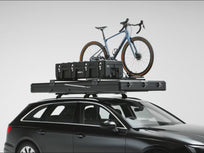 A 360 video of the  TentBox Cargo 2.0  roof tent loaded with cargo bars open and closed on top of a car [autoplay]