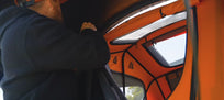 Tunnel awning being put up whilst attached to the Lite XL [autoplay]