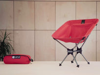 [autoplay] A video showig a closeup of the TentBox Camping Chair in red, complete with storage pockets
