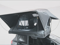 An internal 360 view of the new TentBox Lite roof tent on top of a black car[autoplay]